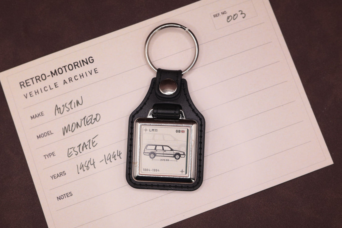 Austin Montego Estate Register Series keyring photographed on a Retro-Motoring vehicle archive card