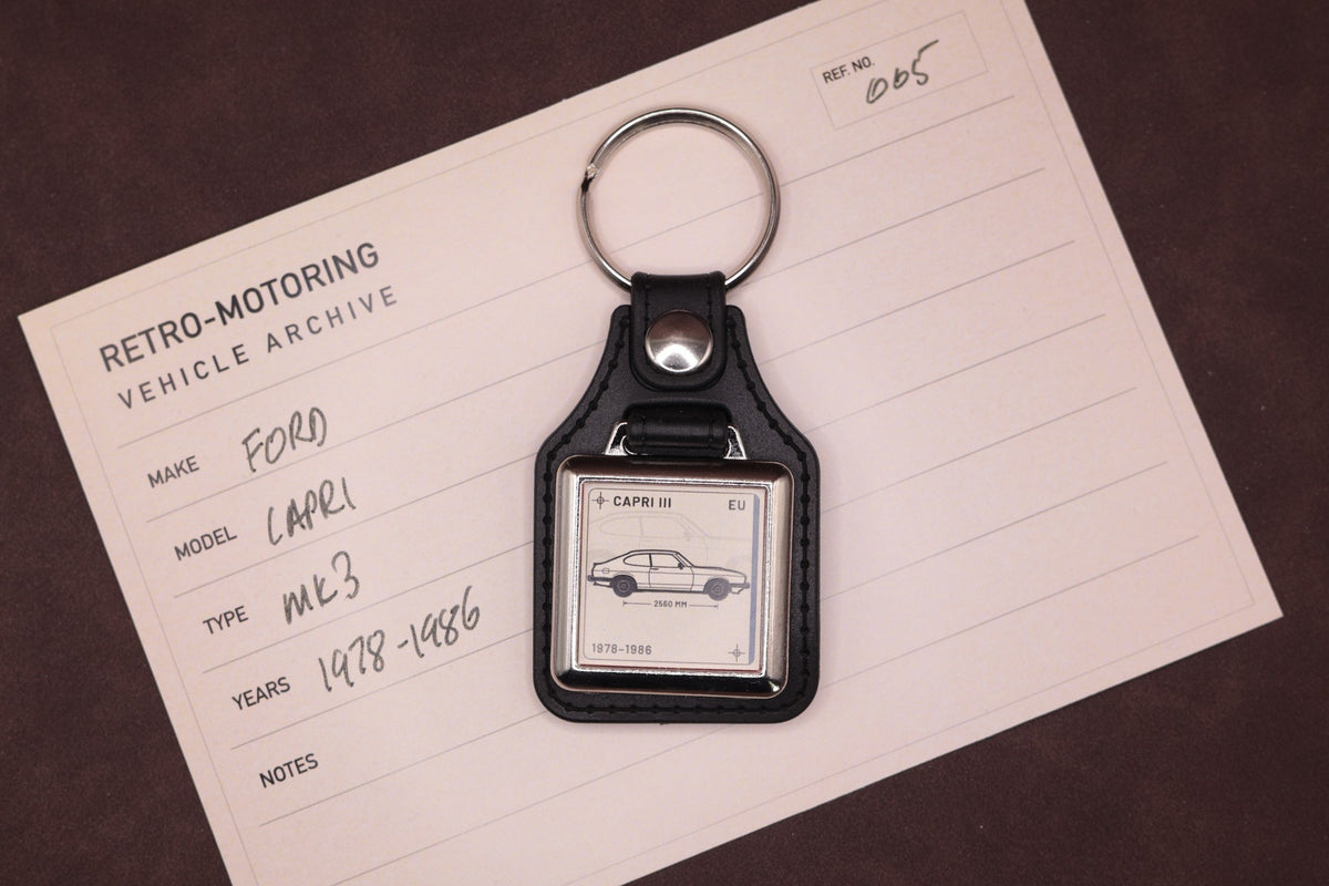 Ford Capri Mk3 Register Series keyring photographed on a Retro-Motoring vehicle archive card