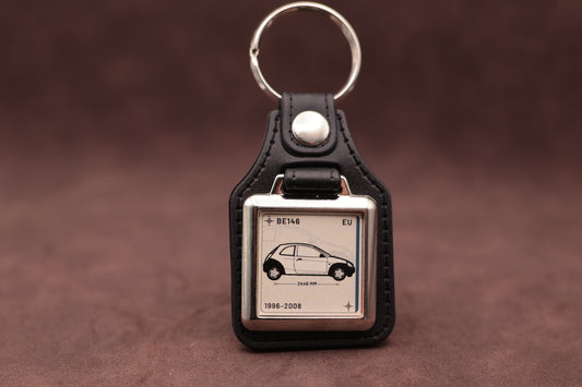 Ford Ka Mk1 Register Series keyring with ivory insert and side-profile vehicle illustration