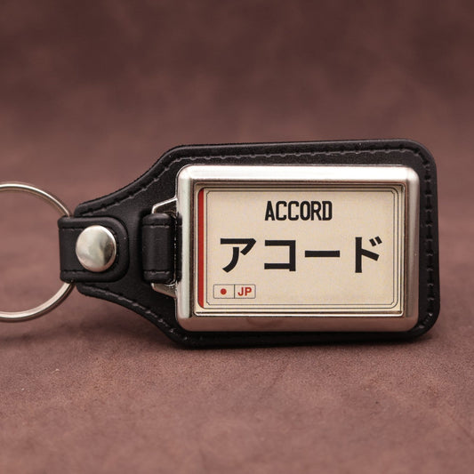 Honda Accord keyring with Japanese katakana and model lettering on a cream plate-inspired insert
