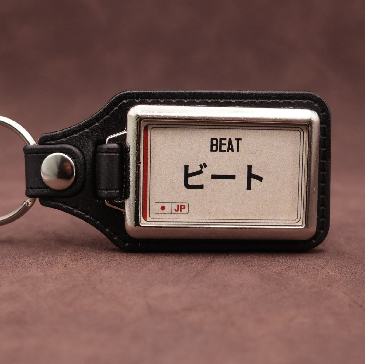 Honda Beat keyring with Japanese katakana and model lettering on a cream plate-inspired insert