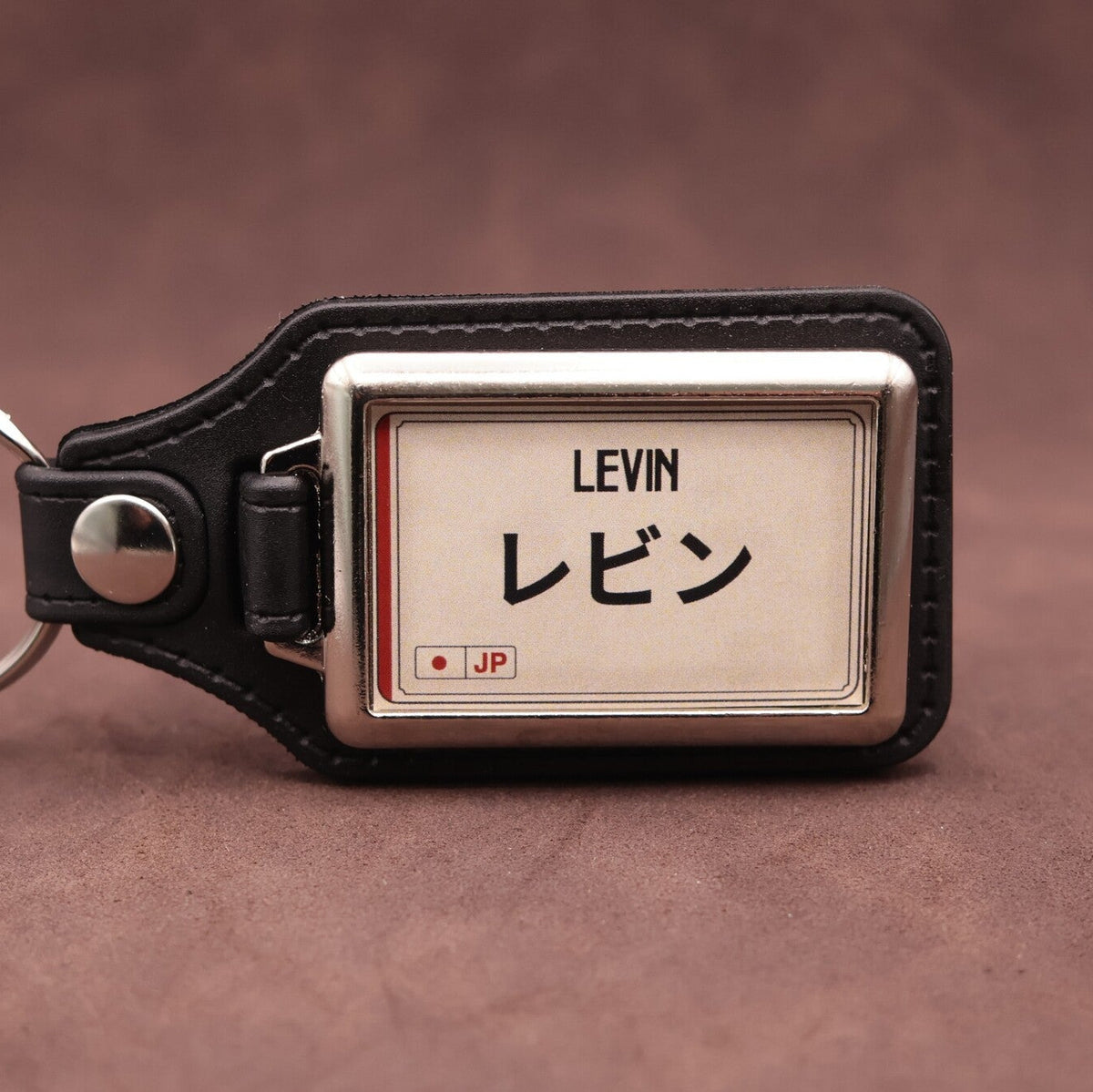 Toyota Levin keyring with Japanese katakana and model lettering on a cream plate-inspired insert
