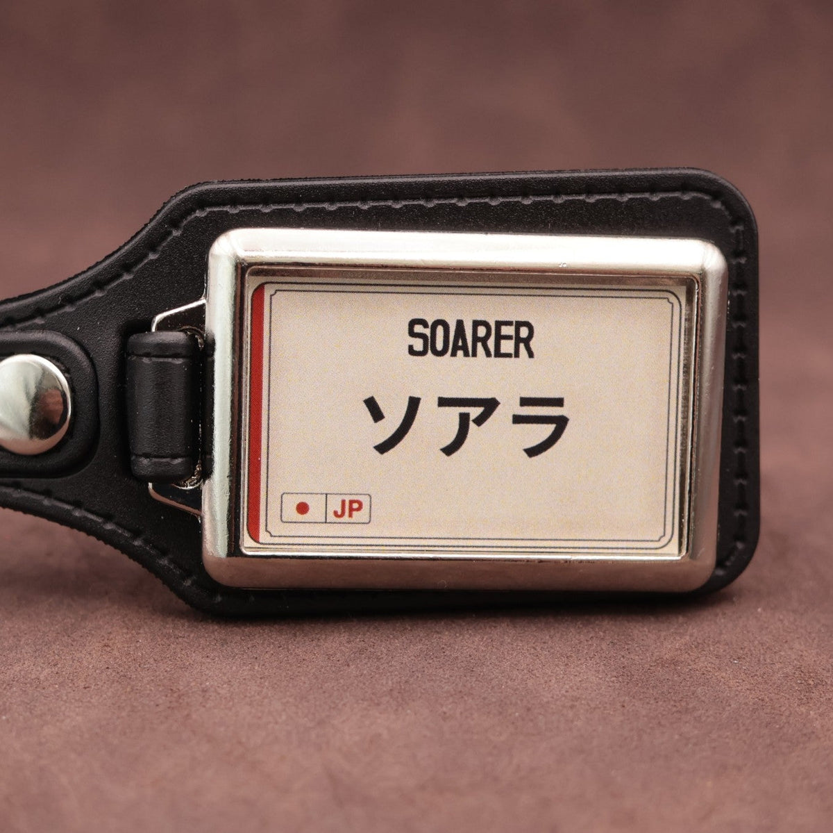 Toyota Soarer keyring with Japanese katakana and model lettering on a cream plate-inspired insert