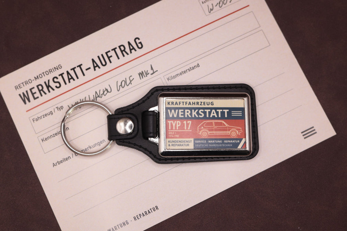 Volkswagen Golf Mk1 Werkstatt keyring photographed with a Werkstatt reference card