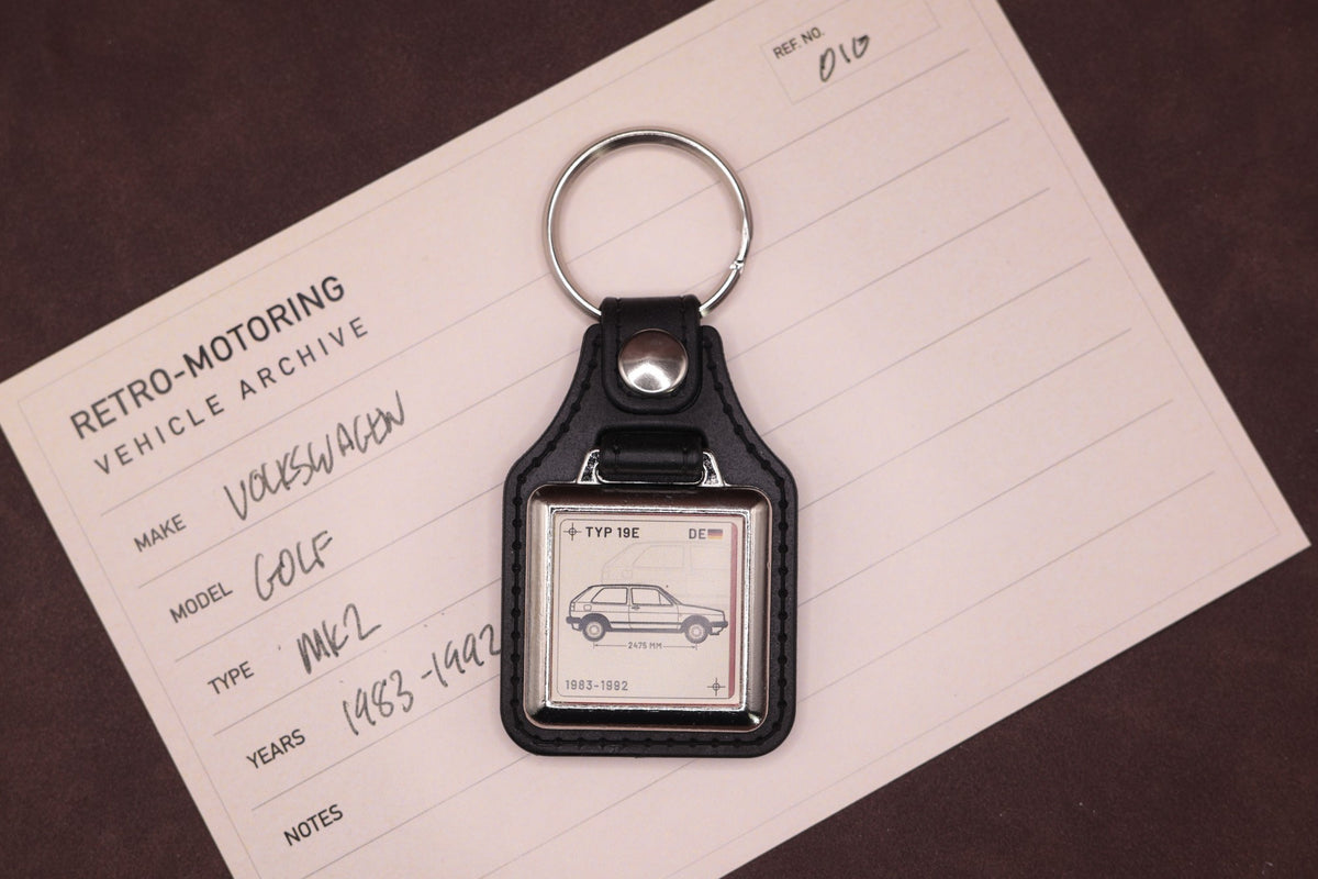 Volkswagen Golf Mk2 Register Series keyring photographed on a Retro-Motoring vehicle archive card