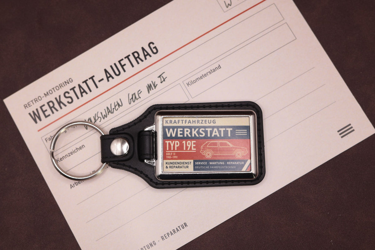 Volkswagen Golf Mk2 Werkstatt keyring photographed with a Werkstatt reference card